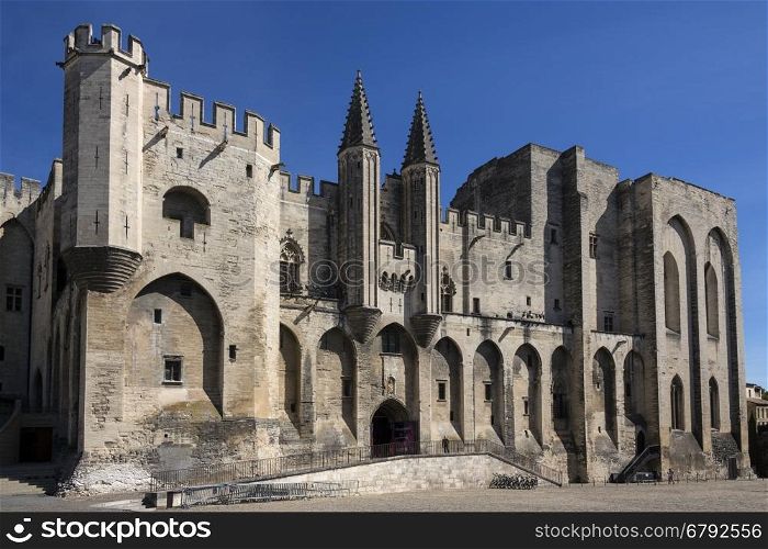 Palais des Papes in the city of Avignon in southeast France in the department of Vaucluse on the left bank of the Rhone River. Once a fortress and palace, the papal residence was the seat of western Christianity during the 14th century. Since 1995, the Palais des Papes, along with the historic center of Avignon, is a UNESCO World Heritage Site.