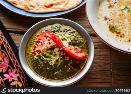 Palak Panner indian recipe food on wooden table