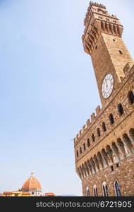 Palazzo della Signoria tower with the Duomo on the background. Copy space
