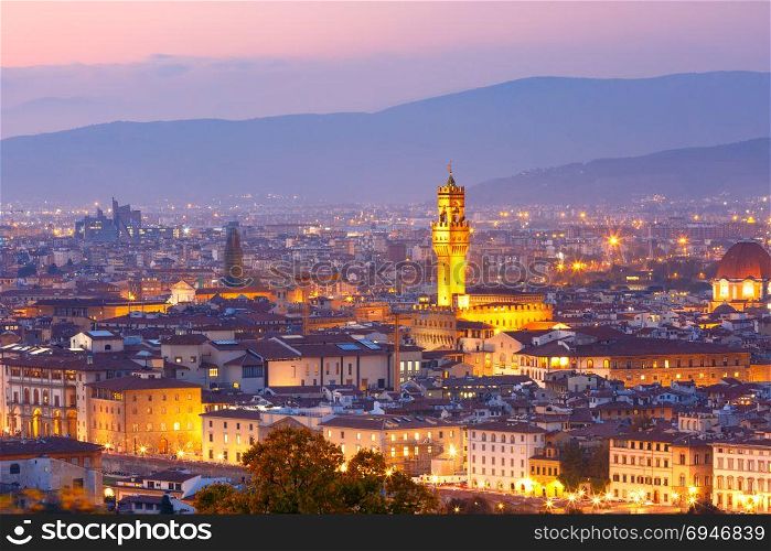 Palazzo Vecchio at sunset in Florence, Italy. Famous Arnolfo tower of Palazzo Vecchio on the Piazza della Signoria at beautiful sunset in Florence, Tuscany, Italy