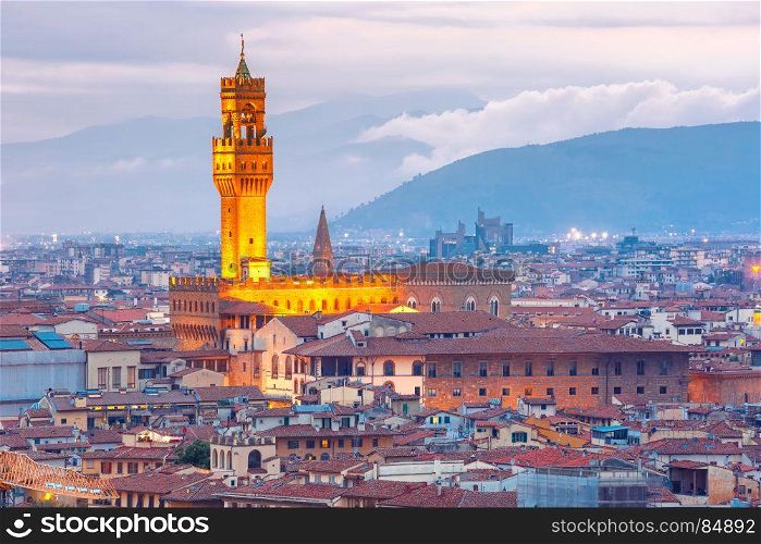 Palazzo Vecchio at sunset in Florence, Italy. Famous tower of Palazzo Vecchio on the Piazza della Signoria at sunset from Piazzale Michelangelo in Florence, Tuscany, Italy