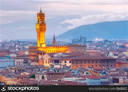 Palazzo Vecchio at sunset in Florence, Italy. Famous tower of Palazzo Vecchio on the Piazza della Signoria at sunset from Piazzale Michelangelo in Florence, Tuscany, Italy