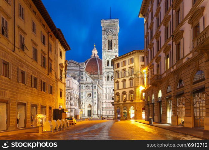 Palazzo Vecchio in the mornng in Florence, Italy. Famous Duomo Santa Maria Del Fiore, Baptistery and Giotto&rsquo;s Campanile on the Piazza del Duomo in the morning in Florence, Tuscany, Italy