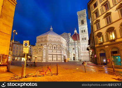 Palazzo Vecchio in the mornng in Florence, Italy. Famous Duomo Santa Maria Del Fiore, Baptistery and Giotto&rsquo;s Campanile on the Piazza del Duomo in the morning in Florence, Tuscany, Italy