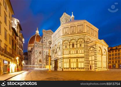 Palazzo Vecchio in the mornng in Florence, Italy. Famous Duomo Santa Maria Del Fiore and Baptistery on the Piazza del Duomo in the morning in Florence, Tuscany, Italy