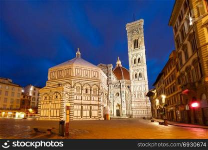 Palazzo Vecchio in the mornng in Florence, Italy. Famous Duomo Santa Maria Del Fiore, Baptistery and Giotto&rsquo;s Campanile on the Piazza del Duomo in the morning in Florence, Tuscany, Italy