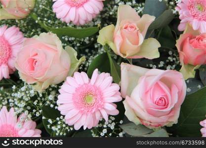 pale pink gerberas and roses in mixed flower arrangement