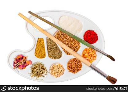 palette with cereals and spices and a pair of brushes