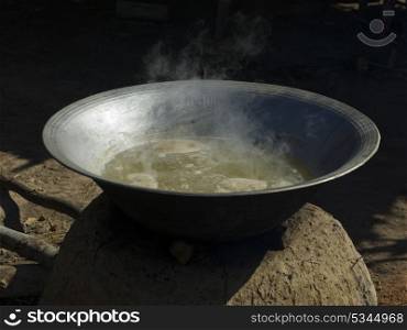 Palm sugar being cooked in pan, Siem Reap, Cambodia
