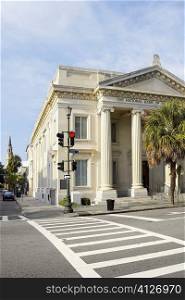 Palm tree in front of a bank, National Bank of South Carolina, Charleston, South Carolina, USA