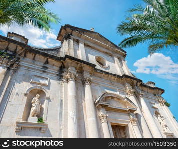 Palm trees near Ancient church in Prcanj, Montenegro