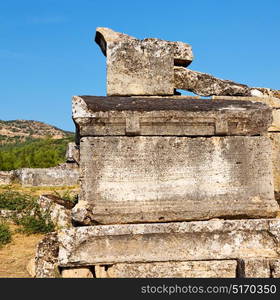 pamukkale old construction in asia turkey the column and the roman temple