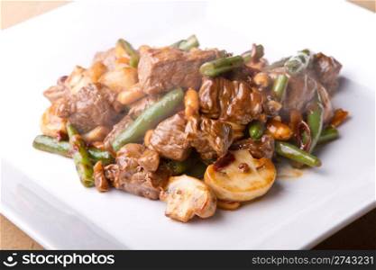 Pan asian stir fry with beef, green beans, and peanuts