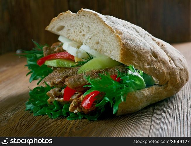 Pan-bagnat sandwich that is a specialty of the region of Nice, France.