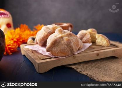 Pan de Muerto. Typical Mexican sweet bread that is consumed in the season of the day of the dead. It is a main element in the altars and offerings in the festivity of the day of the dead.