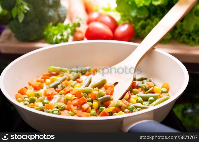 pan of chopped vegetables on the cooker