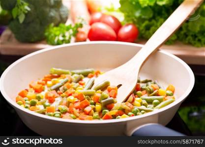 pan of chopped vegetables on the cooker