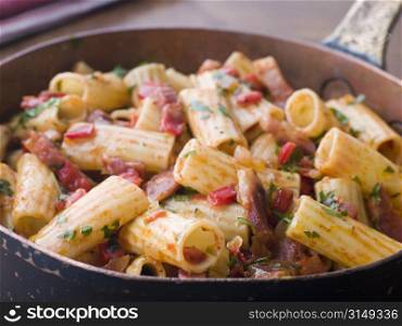 Pan of Rigatoni Pasta with Tomato and Pancetta Sauce