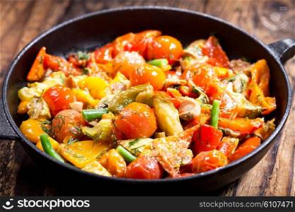 pan of roasted vegetables on wooden table