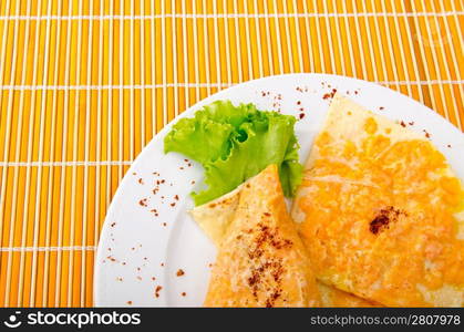 Pancake with pumpkin in plate