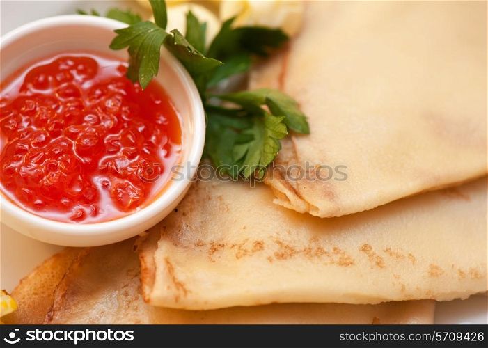 pancake with red caviar closeup