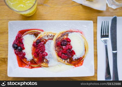 Pancakers with berries and cream