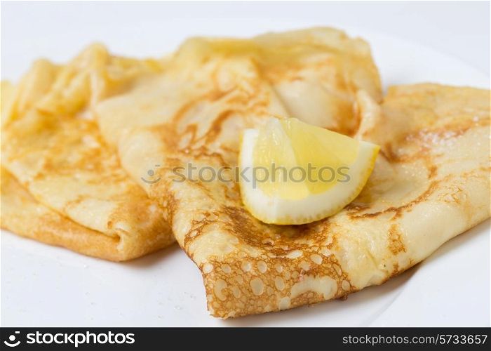 "Pancakes English-style, with sugar and lemon, most traditionally served on Shrove Tuesday aka "pancake day","