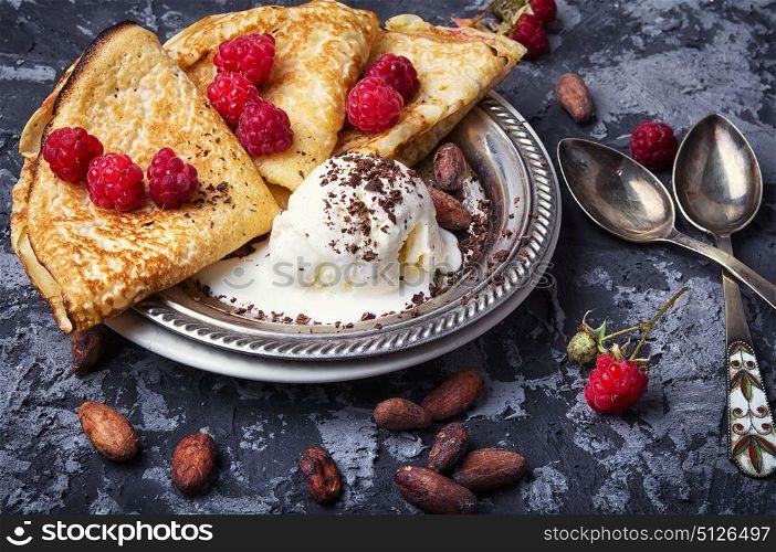 Pancakes with berries. homemade pancakes with raspberries and cocoa beans