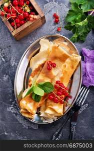 pancakes with fresh red currant, stock photo