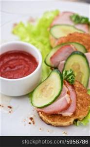 pancakes with ham and cucumber . pancakes with ham and cucumber with tomato sauce and lettuce