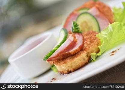 pancakes with ham and cucumber . pancakes with ham and cucumber with tomato sauce and lettuce