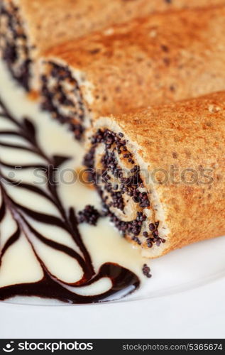 Pancakes with poppy seeds close-up.