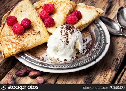 pancakes with raspberries. Homemade pancakes with fresh raspberries and ice cream. Shrovetide
