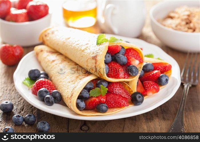 pancakes with strawberry blueberry for breakfast