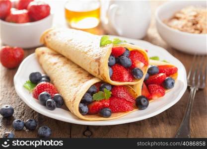 pancakes with strawberry blueberry for breakfast