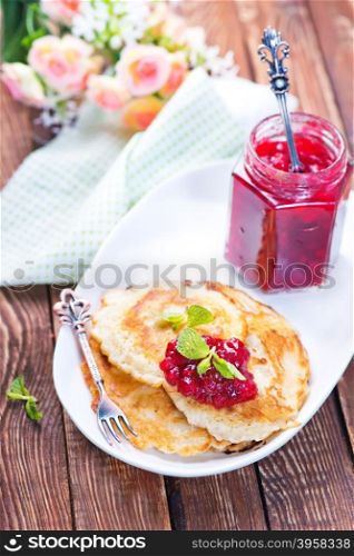 pancakes with sweet jam on the plate