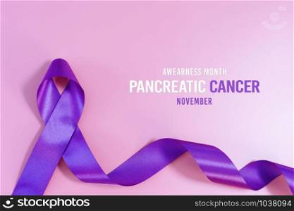 Pancreatic Cancer Awareness Ribbon, purple ribbons on light pink background