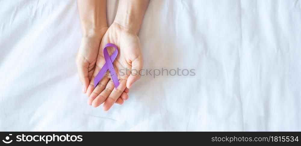 Pancreatic Cancer, testicular, world Alzheimer, epilepsy, lupus and violence day Awareness month, Woman holding purple Ribbon for supporting people living. Healthcare and World cancer day concept