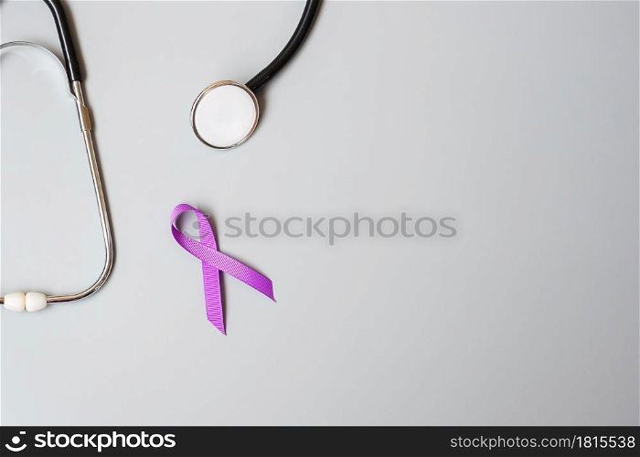 Pancreatic Cancer, world Alzheimer, epilepsy, lupus and domestic violence day Awareness month, Woman holding purple Ribbon with stethoscope. Healthcare and World cancer day concept