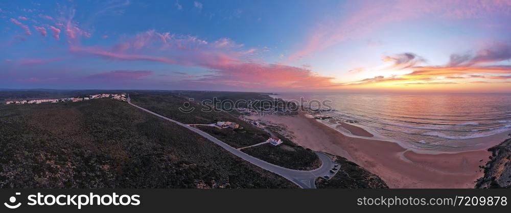 Panorama aerial from Monte Clerigo at the west coast in Portugal at sunset