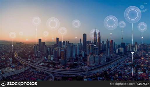 Panorama aerial view in the cityscape skyline with network connection concept , early morning sunrise scene .
