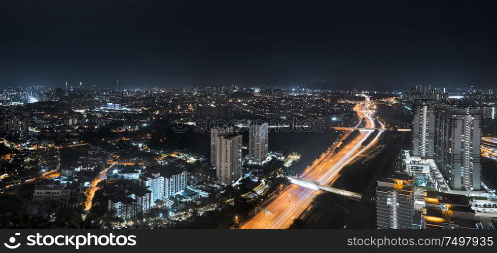 Panorama aerial view in the middle of Kuala Lumpur cityscape skyline .Night scene , Malaysia .