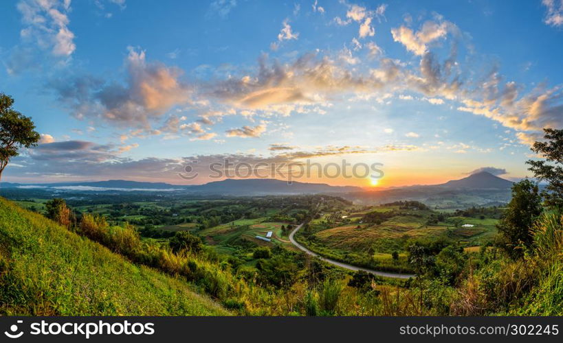 Panorama beautiful nature landscape of the colorful sky and mountains during the sunrise at Khao Takhian Ngo View Point, Khao Kho attractions in Phetchabun, Thailand. Panorama sunrise at Khao Takhian Ngo View Point