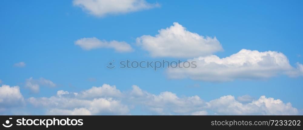 Panorama blue sky fluffy white cloud summertime on light sunny day cloudscape. Clear bright blue skyline sunlight climate panoramic background. Heaven blue environment ecology scenic nature background