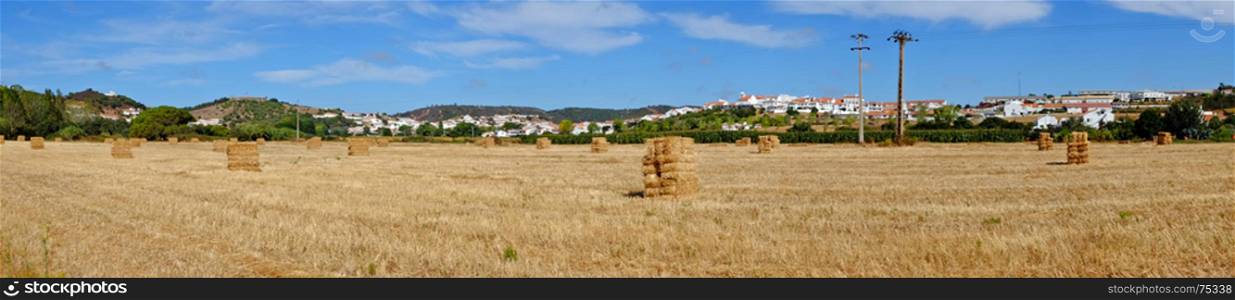 Panorama from haybales in the fields in Alentejo Portugal