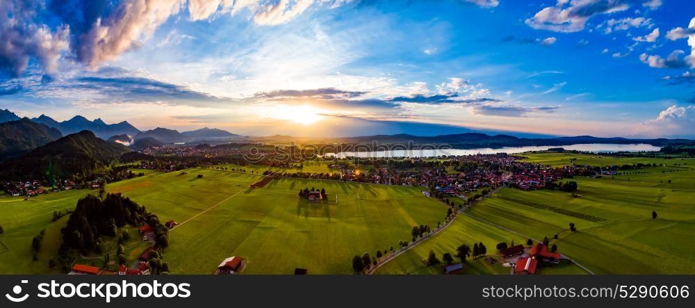 Panorama from the air sunset Forggensee and Schwangau, Germany, Bavaria