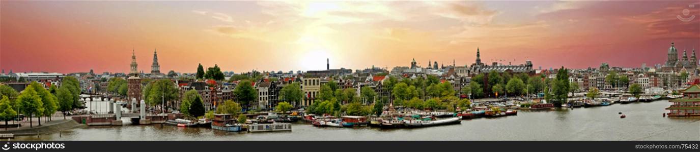 Panorama from the city Amsterdam in the Netherlands at sunset