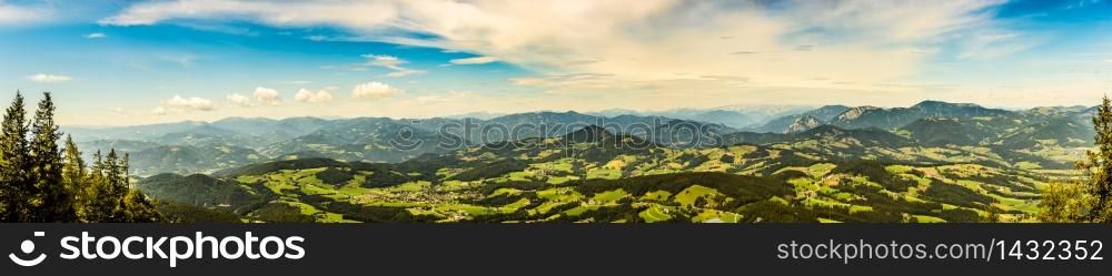 Panorama landscape view during sunset in summer from Graz Schockl mountain in Styria, Austria. Famous tourist destination ,hiking and mountain biking spot.. Panorama landscape view during sunset in spring from Graz Schockl mountain