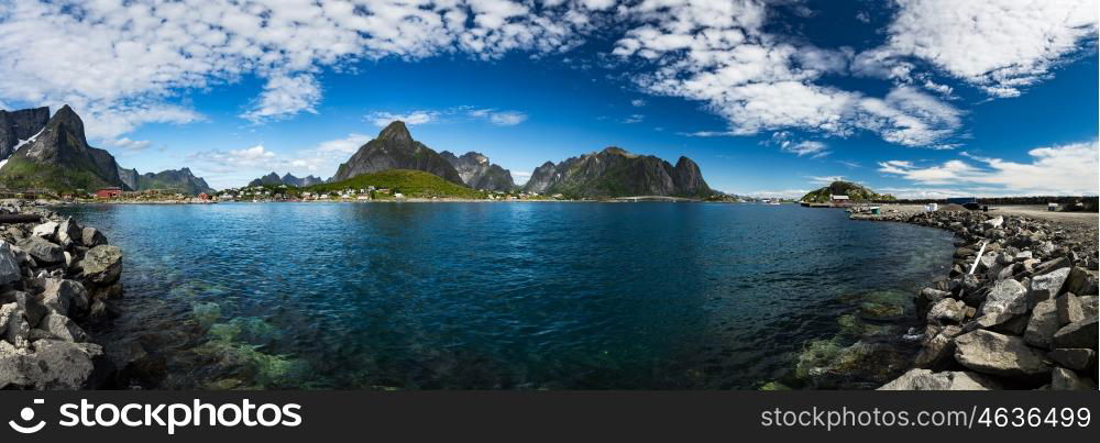 Panorama Lofoten islands in the county of Nordland, Norway. Is known for a distinctive scenery with dramatic mountains and peaks, open sea and sheltered bays, beaches and untouched lands.