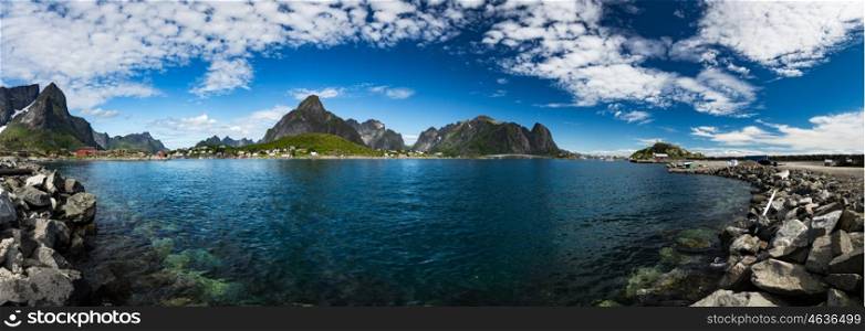 Panorama Lofoten islands in the county of Nordland, Norway. Is known for a distinctive scenery with dramatic mountains and peaks, open sea and sheltered bays, beaches and untouched lands.